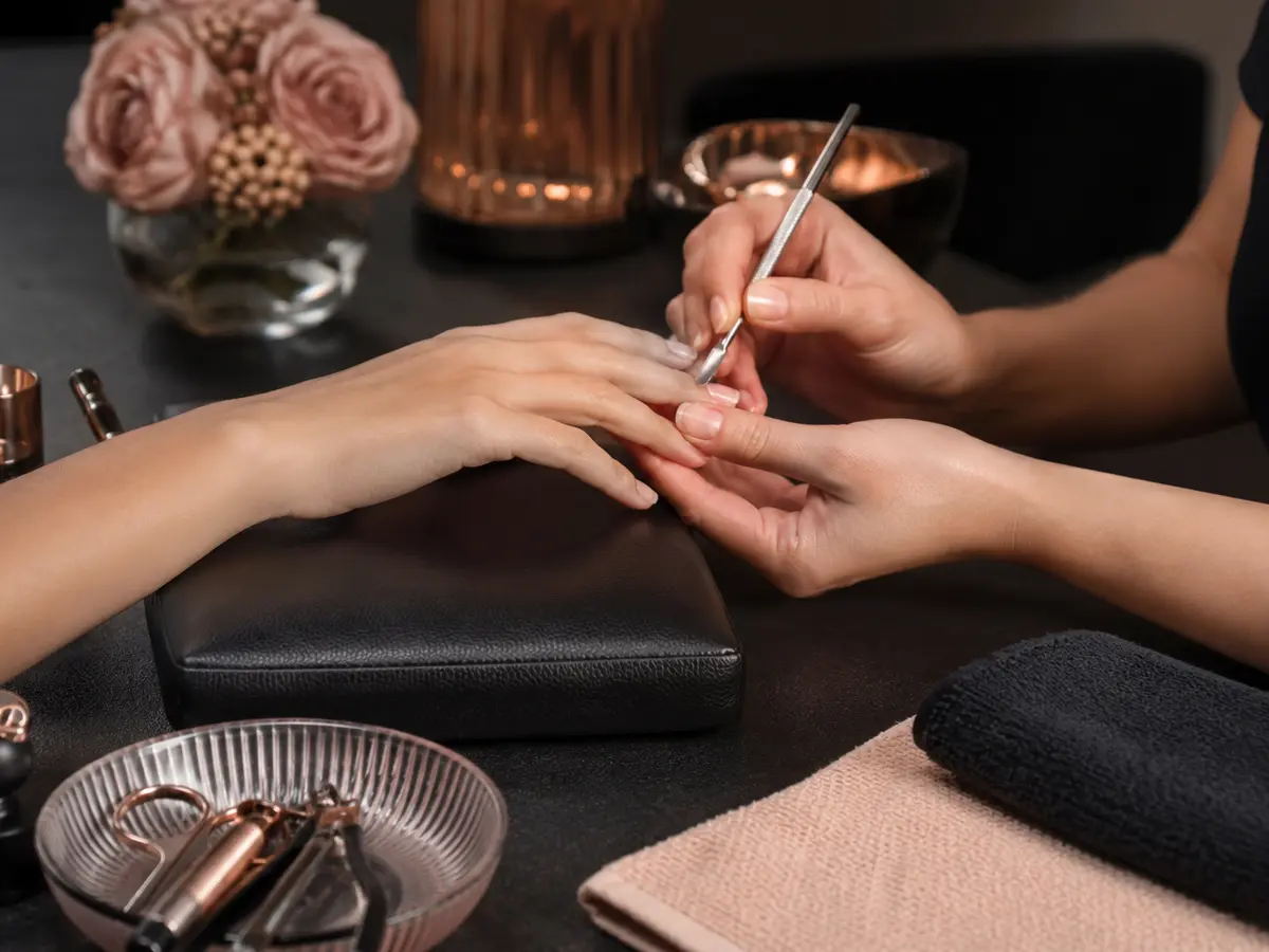 Manicure service with polished nails